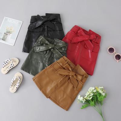 China QUICK DRY Fashion Style Kids Girl Western Pu Skirts Pocket Autumn Children Casual Dress Bowknot Mini Skirts for sale