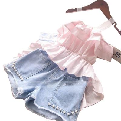 China Lady style 2021 summer new girl's fashion sling dovetail skirt tops and denim shorts two-piece suit for sale