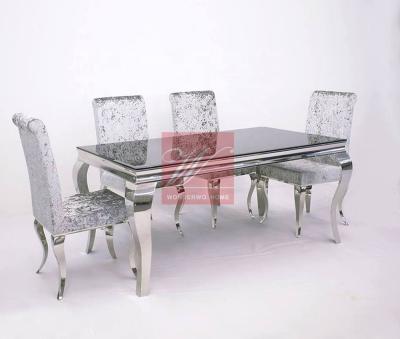 China Modern Hot Sale Glass Dining Table With Stainless Steel Base And Velvet Fabric Upholstery Dining Sets Dining Room Furniture for sale