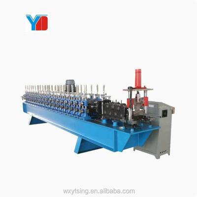 China Automatic Galvanized Steel Building Material Stores Cross Rail Omega Purlin Ceiling Channel Top Strut Roll Forming Machine for sale