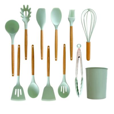 China Viable Hot Selling 12Pcs Silicone Handles Kitchen Multifunctional Cookware Kitchen Instruments Wooden Tool Kit for sale