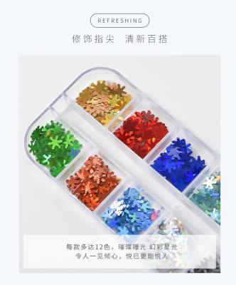 China Easy Apply Organic Long Strip Boxed Fluorescent Mixed Butterfly Nail Piece Maple Leaf Letter Sequin Nail Decoration for sale