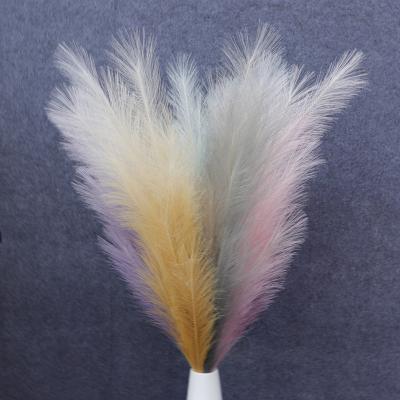 China Amazon direct selling hotChina factory direct selling beautiful fabric 18 fork artificial flower wall artificial pampas grass colorful outdoor gradient color for sale