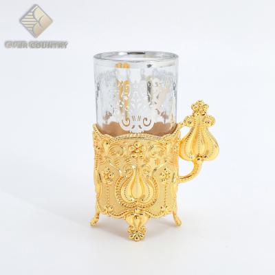 China Viable set for six glass tea cups and saucers from Tulip Design Metal Gold Plated for sale