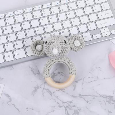 China Giraffe Musical Handmade Rabbit Elephant Crochet Rattle Wooden Teether Toy for sale