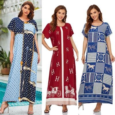 China Dubai Anti-wrinkle Muslim Women's Dress Long Skirt Border Short Sleeve Women's Clothing Big Swing Islamic Large Size Loose Long Dress for sale