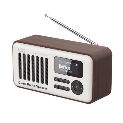 China Dual USB/TF Home Radio Wooden Wireless Playback Speaker Radio Alarm Clock for sale