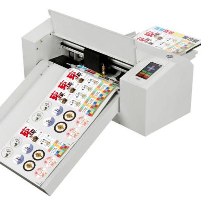 China Vinyl Sticker/PVC/heat Transfer Bascocut Cutting Cutter /Digital Machine Sticker Label Auto Feeding Die Cutting Cutter for sale