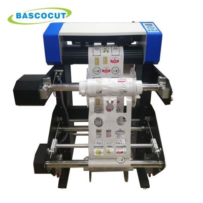 China Sticker Label Bascocut A3+ Cutting Scanning QR Code Auto Roll To Roll Vinyl Sticker Label Cutter for sale