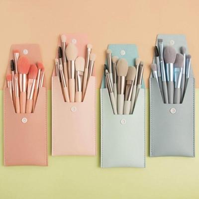 China Angular Blush 8pcs Mini Makeup Brushes Kit Custom Logo Matte Small Makeup Brush Travel Set With Pink Blue Bag for sale