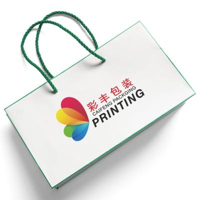 China White Handbag In Food Standard Craft Paper Waterproof Environment With Customized LOGO Design for sale