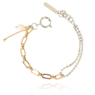 China Women Gold and Silver Mosaic Diamond Chain Cross Freshwater Pearl Tassel Bracelet for Women for sale