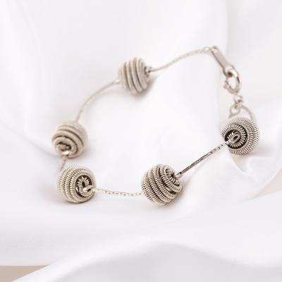 China New niche bracelet women's sense bracelet string all-in-one retro design spiral women's high color plated for sale