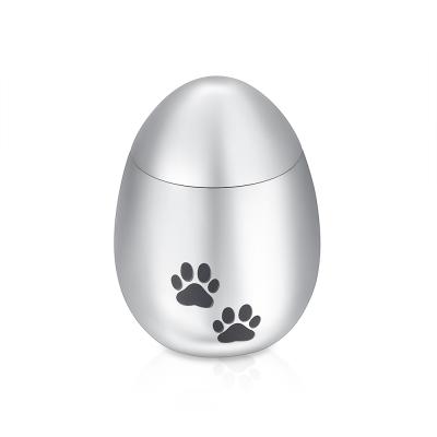 China Fashion Jewelry Paw Print Stainless Steel Egg Keepsake Shaped Cremation Ash Urn For Human Pet Ash Urn Necklace for sale