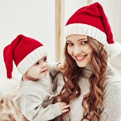 China Christmas Santa Hat Plush Lovely Ball Latest/Winter Fashion Knitted Beanie Christmas Hat For Adult And Kids for sale