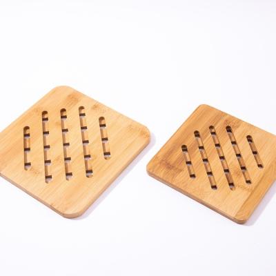 China Factory Wholesale Price Sustainable Reusable Bamboo Coasters Kitchen Insulation Heat Resistant Pads for sale