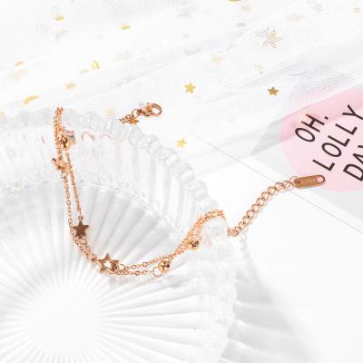 China Hot Selling FASHIONABLE Rose Gold Double Layered Anklets 316l Stainless Steel Hollow Out Stars Shape Dangling Anklets for sale