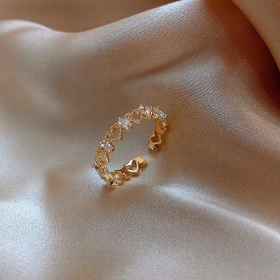 China Banquet Environmental Friendly Jewelry For Women Gold Plated Zircon Opening Heart Shaped Rings Hollow Out Heart Rings for sale