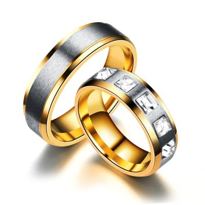 China Wholesale Romantic Stainless Steel Diamond Wedding Rings Gold Plated Fashion Zirconia Couple Rings Jewelry for sale