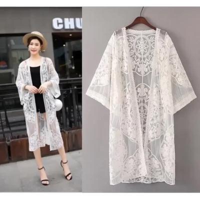 China Plus Size Cavity Embroidery Beach Holiday Sunscreen Shawl Lace Cardigan Loose Large Size Women Beach Wear Cover Up for sale