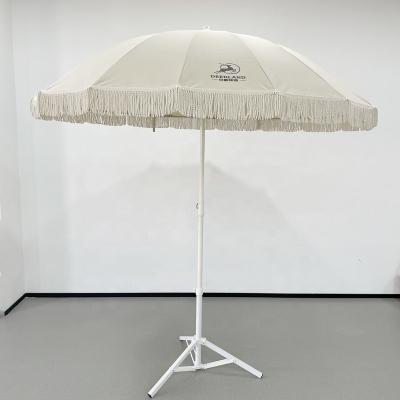 China Luxury Portable Beige Color Polish Logo Garden Parasol Korean Customizable Steel Beach Umbrella With Tassels Vintage for sale