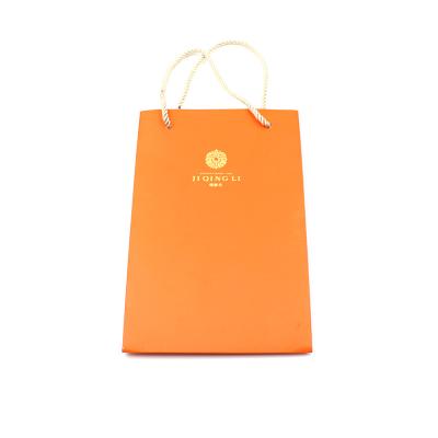 China Recycled Materials New Arrival Gift Paper Bag Reusable Shopping Paper Bag With Ribbon Handle for sale