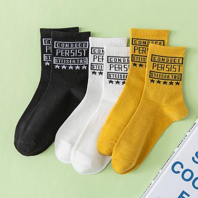 China Hot sale sporty men's letter mid-tube socks wholesale men's cotton casual five-pointed star socks for sale