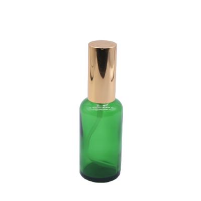 China Cosmetic Green Mini Perfume 10ml Spray Bottle Essential Oil Glass Bottle for sale