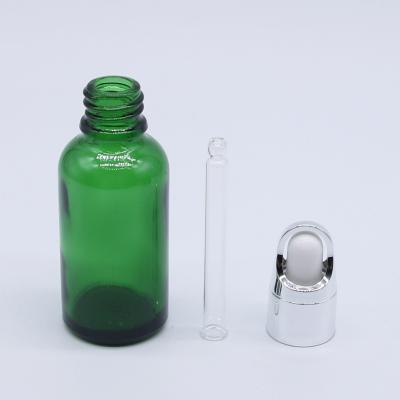 China 2021 Hot Sale Cosmetic Dropper Bottle Green Appearance 5ml Sensitive Glass Essential Oil Bottle for sale