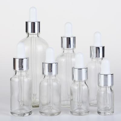 China Personal care hot sale factory direct gold essential oil bottle 100ml square dropper cheap bottle glass for sale