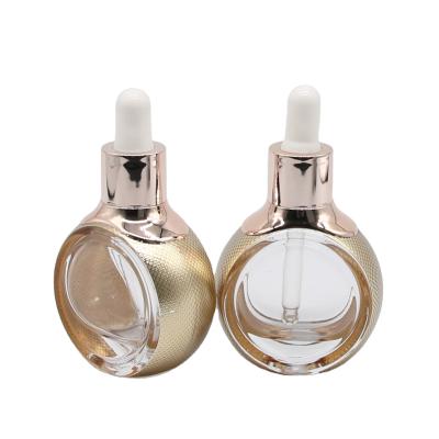 China 30ml Cosmetic Thick Bottom Clear Serum Glass Bottle Clear Round Custom Serum Bottle With Dropper for sale