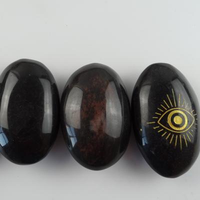 China China natural high quality healing polished obsidian black palm with eye stone for sale for sale