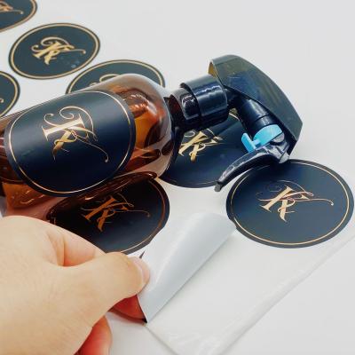 China Waterproof custom hot selling self adhesive waterproof matte rose oil hot stamping promotion label stickers for business products for sale