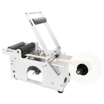 China Simple Operation semi - automatic round bottle labeling machine adjustable labeler small semi auto labeling machine for bottle products for sale