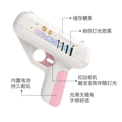 China Paddling Toys Pop Plastic Candy Gun New Candy Gun Toys Set Kids Launch Soft Candy Toys for sale