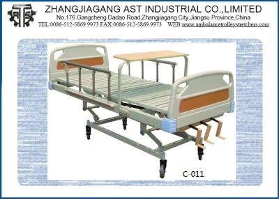 China Triple Crank Foldable Manual Hospital Bed Three Function Aluminum Alloy with Dinning Table for sale