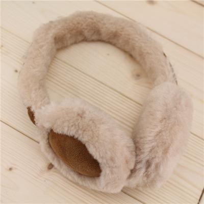 China Newest Cheap Headband Earmuffs Warm Leopard Plush Headsets Earphone Manufacturer for sale