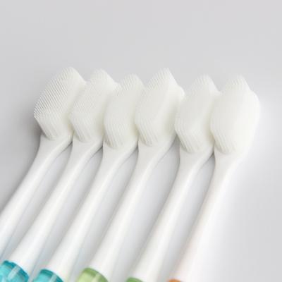 China Adult toothbrush ultra fine soft white bristle toothbrush degradable for sale