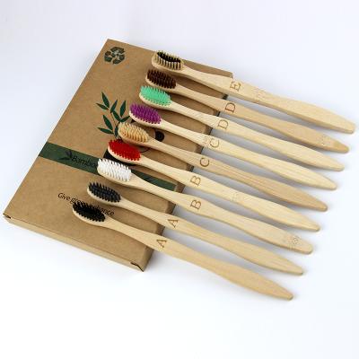 中国 Natural biodegradable adult bamboo toothbrush set bamboo wood toothbrush charcoal 販売のため