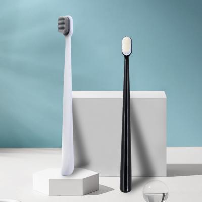 China 2021 New Design Portable Travel 10000 20000 Wave Ultra Micro Rubber Nano Soft Bristle Toothbrush en venta