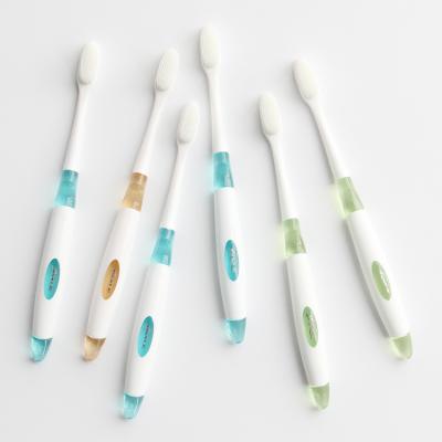 China Nano toothbrush ultra fine and soft bristle for home use white color Degradable handle for sale