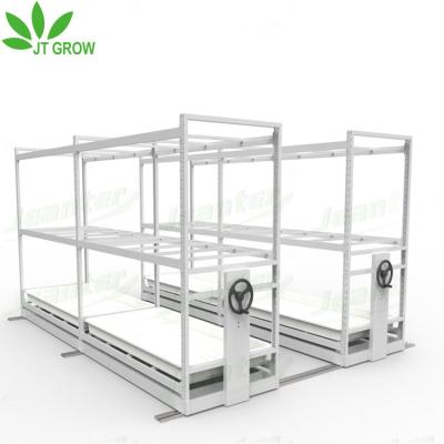 China Hydroponic Indoor Vertical Grow Rack Greenhaus Multi-Layer Growth Control Grow Tables 4*8Ft With Track for sale