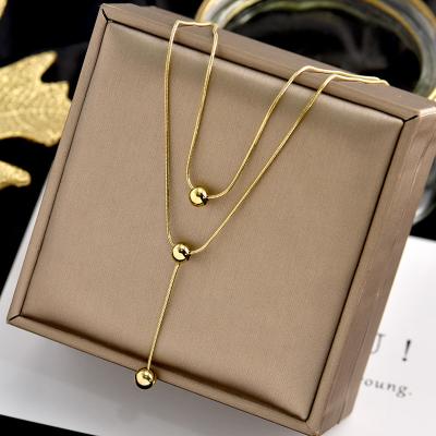 China FASHIONABLE High Quality Waterproof Stainless Steel Gold Plated Double Layered Drop Ball Pendant Necklace for sale