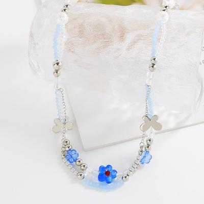 China TRENDY Non Tarnish Custom Layered Designer Stainless Steel Flower Butterfly Blue Chain Beaded Necklace For Women Men for sale