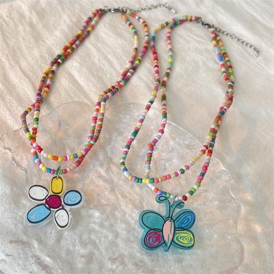 China Summer BOHO TRENDY Customized Tasty Resin Flower Butterfly Acrylic Pendant Beaded Necklace For Women Men for sale