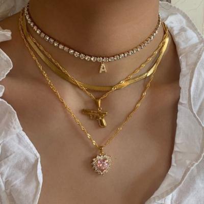 China 2022 new styles TRENDY 18k gold plated letter 3 layers gun heart diamond layered necklace for woman for sale