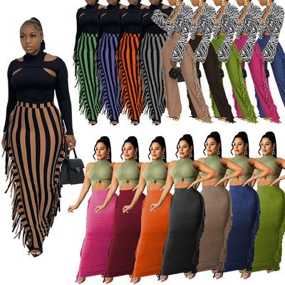 China Fashion Women Clothing Maxi Skirt High Waist Anti-Static Striped Casual Tassel Long Skirts for sale