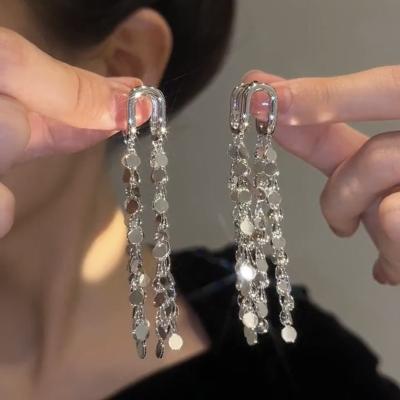 China FASHIONABLE fresh silver U-shape sequin temperament tassel light luxury vintage style high-end feeling personalized soft earrings for sale