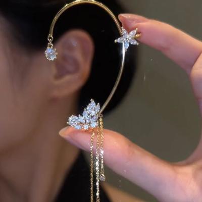 China FASHIONABLE flower tassel ear blooming hanger without ear holes designed by high grade small star assist soft ear clip earrings for sale