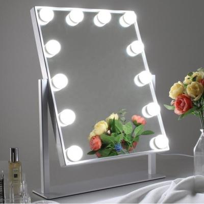 China Metal Hollywood Vanity Magic Mirror Led With 12 Led Bulbs 360 Degree Rotation Make Up Led Light Mirror for sale